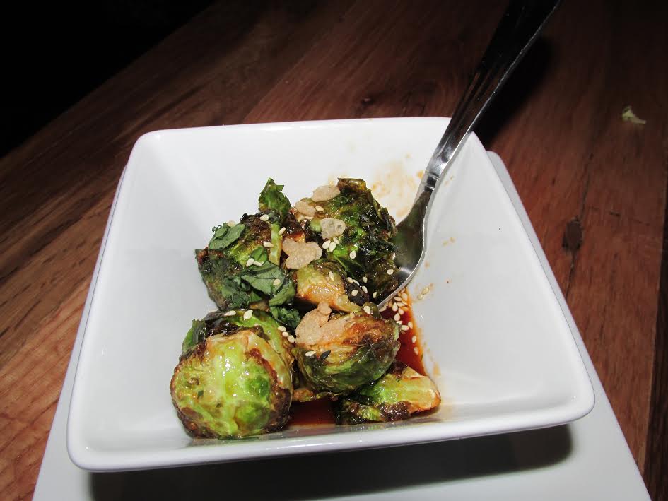 Crispy Brussels: Mint, cilantro, truffle-chili glaze, snap, crackle, pop.