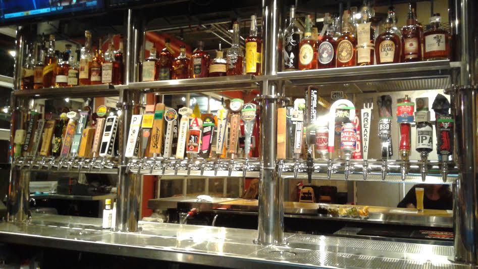 Some of the taps on one side of the bar